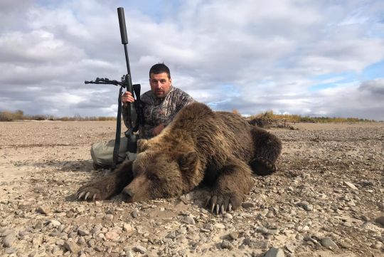 Hunting to brown bear in Russia